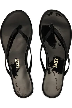 Tkees Glosses Flip Flop in - Black. Size 5 (also in 7).