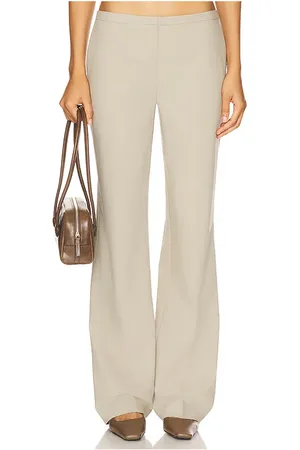 EAVES Colby Low Rise Trouser in - Beige. Size L (also in M, S, XL, XS, XXS).