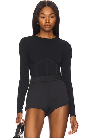 FLEUR DU MAL Organic Cotton Long Sleeve T-shirt Bodysuit in - . Size L (also in M, XL, XS).