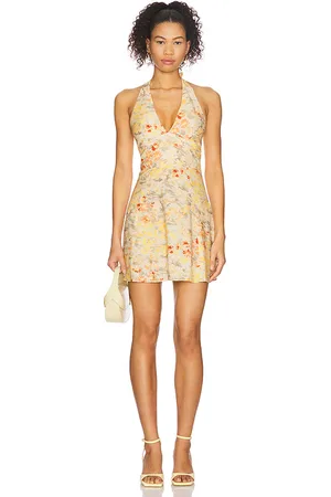 FAITHFULL THE BRAND Mira Mini Dress in - Yellow. Size L (also in M, S, XL, XS).