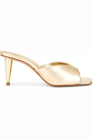 Schutz Dethalia Pin Heel Sandal in - Metallic Gold. Size 10 (also in 6, 6.5, 7, 7.5, 8, 8.5, 9.5).
