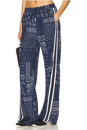The Upside Vaquero Roma Pant in - Navy. Size L (also in M, S, XL, XXS).