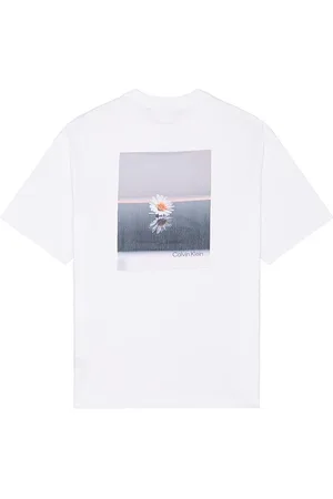 Calvin Klein Flower Applique Relaxed Crewneck Tee in - White. Size L (also in M, S, XL/1X).