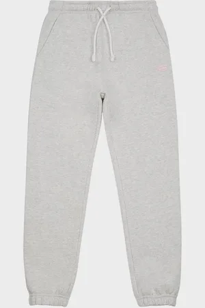 New Balance French Terry Small Logo Jogger unissexo Calças de treino cinzento tamanho 134 Vestuário