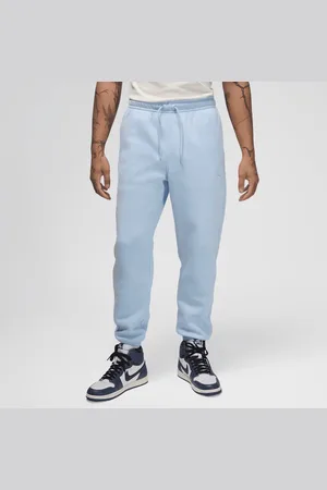 Jordan Brooklyn Fleece Pants homem Calças de treino azul tamanho S Vestuário