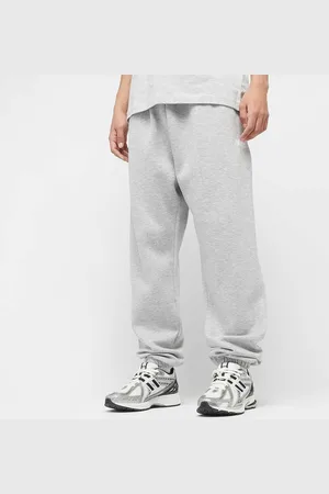 New Balance Sport Essentials Fleece Jogger homem Calças de treino cinzento tamanho L Vestuário