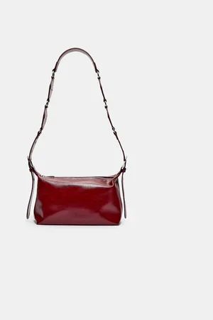 Stradivarius Mala a tiracolo com tachas OS